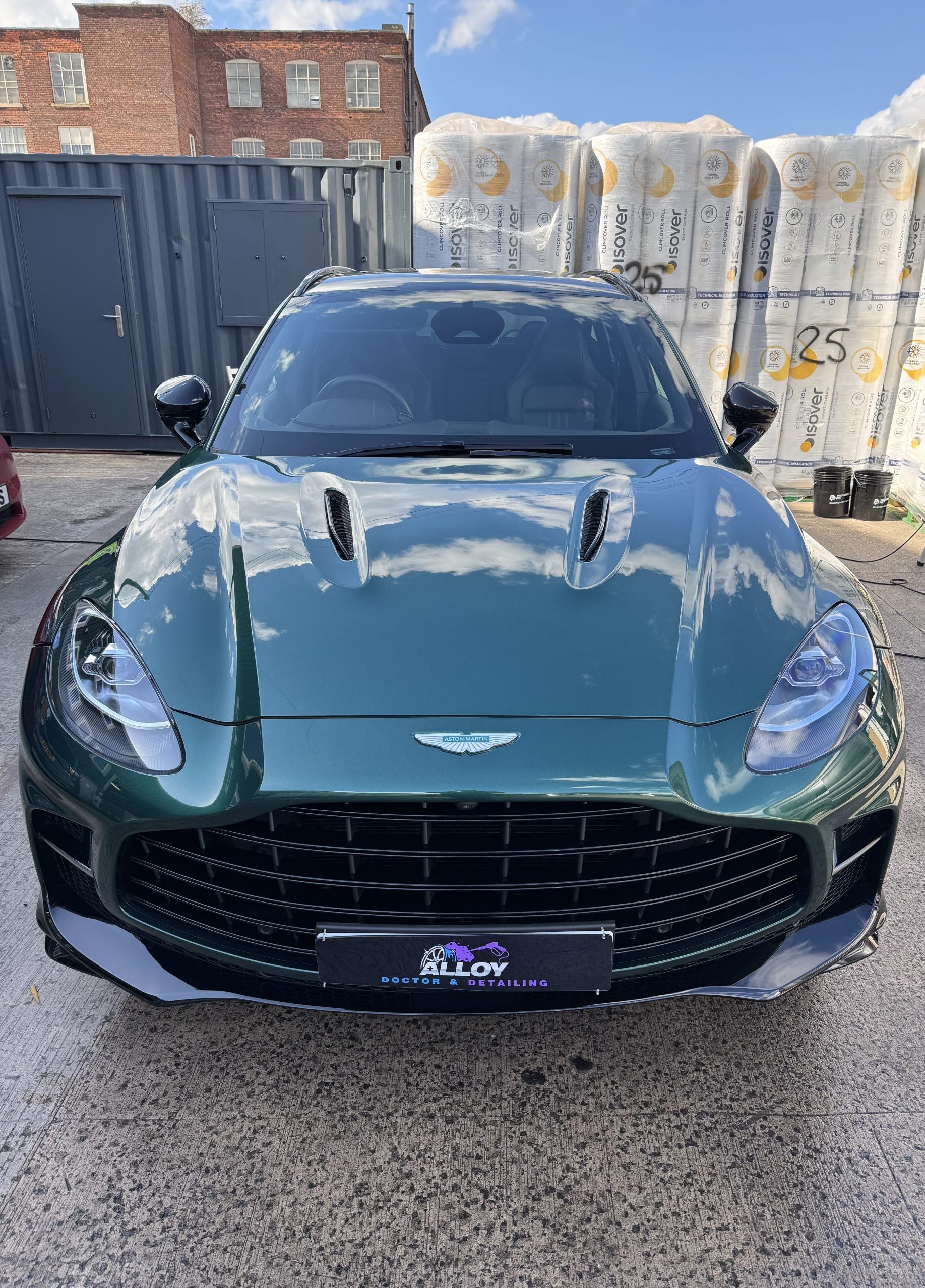 Green Aston Martin following a deep clean