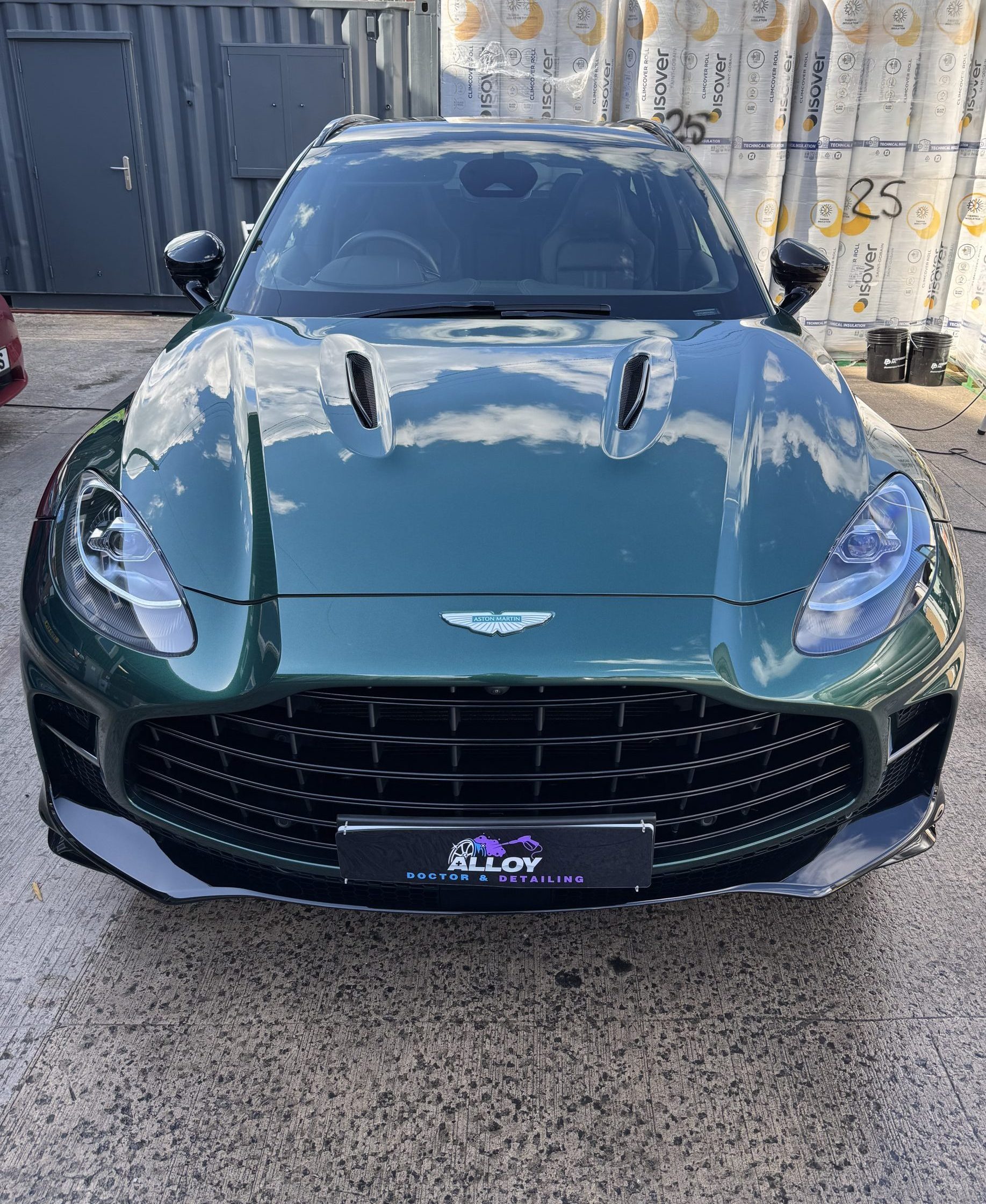 Green Aston Martin following a deep clean